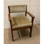 A Mid Century green upholstered arm chair