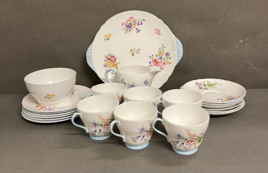 A part Shelly tea service "Wild Flowers" to include cups, saucers and a milk jug