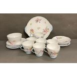 A part Shelly tea service "Wild Flowers" to include cups, saucers and a milk jug
