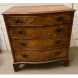 A reproduction George III serpentine chest of drawers raised on bracket feet (H85cm W79cm D50cm)