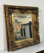 A gilt mirror (82cm x 90cm)