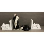 A selection of ceramic cats to include a pair of bookends and a sleeping Staffordshire Just Cats and