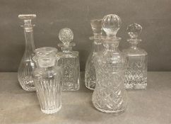 A selection of six cut glass decanters