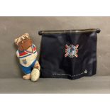 A bulldog bobby world cup mascot and a plastic document case commemoration the 1966 world cup