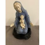 An alabaster Madonna and child on stand (H24cm with outstand)