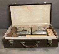 A cased vintage picnic set to include glasses, bottles and food containers AF