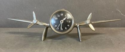 An Art Deco style twin engine aeroplane desk clock