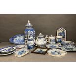 A quantity of blue and white china to include Spode, Delft and Limoges