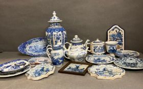 A quantity of blue and white china to include Spode, Delft and Limoges