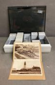A box of photographic slides of steam trains