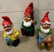Three working garden gnomes
