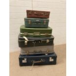 Six vintage suitcases, ideal for display or as prop