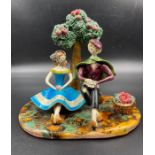 A Neuquelman of Paris figurine of a couple under an apple tree AF