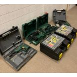 A selection of power tools by Bosch and two Stanley work boxes