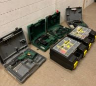 A selection of power tools by Bosch and two Stanley work boxes