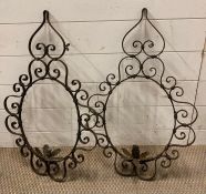 A pair of wrought iron decorative wall candle holders, possibly Italian AF