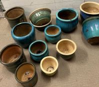 A selection of garden glazed pots various sizes