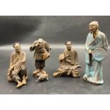 A selection of four Oriental 18th Century 'mud man' clay figures AF
