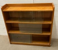 A Utilitarian glazed bookcase (H92cm W92cm D22cm)