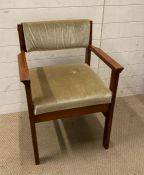A Mid Century green upholstered arm chair