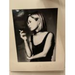 A eighty's pin up signed Mariella Frostrup photograph