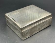 A silver cigarette box with machine tooled decoration by William Hutton & Sons Ltd, hallmarked for