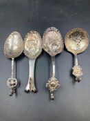 A selection of four antique silver Dutch caddy spoons