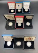 Royal Mint a selection of nine boxed with papers silver proof £1 coins celebrating various world and