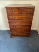 A reproduction chest of drawers, two over five on bracket feet (H120cm W80cm D47cm)