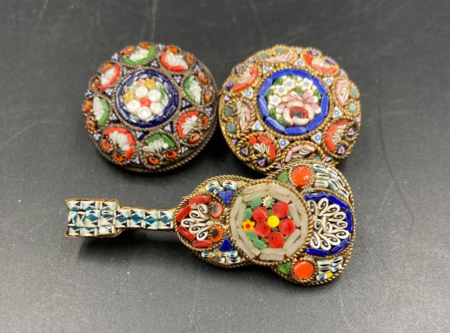 A selection of three micro mosaic venetian brooches to include a guitar