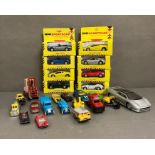 A selection of diecast, play worn cars and eight boxed by Maisto.
