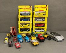 A selection of diecast, play worn cars and eight boxed by Maisto.