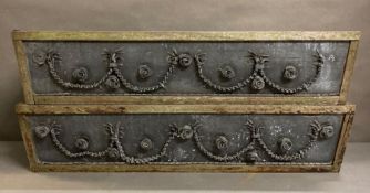 A pair of wooden framed window boxes with intricate floral lead work to the front and lead panelling