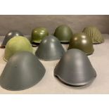 A selection of reproduction military helmets