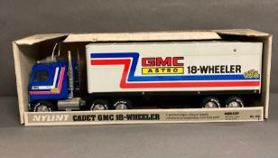 A vintage Nylint GMC Astro semi truck and trailer 18 wheeler "Bigrig" metal toy