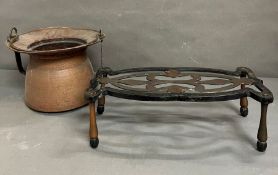 A brass trivet stand by W T and S (William Tonks + Sons ) along with a copper pan