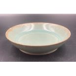 A 20th century Chinese Celadon dish. Diameter 13.5 cm