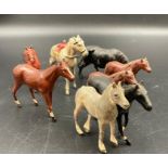 A selection of lead and metal painted horses