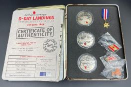 Royal Mint 60th Anniversary D Day Landings Commemorative Collection in metal box with supporting