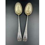 Two silver Georgian spoons with berry design, London 1802 probably by Thomas Whipham