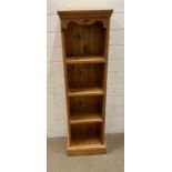 A pine open shelving unit