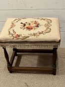 A mahogany stool with needle work seat pad (H45cm W46cm D29cm)
