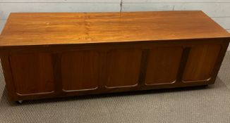 A Mid Century hinged chested panelled to front