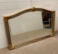 A framed over mantel mirror with faceted mirrored glass to boarder (127cm x 89cm)