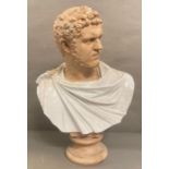 A terracotta bust of the roman emperor Caracalla with a white glazed toga. Height 66cm