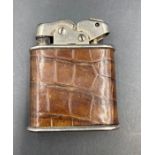 A rare vintage Thorens Swiss leather bound lighter