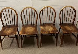 Four oak ercol stick back dining chairs