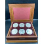 A ROYAL MINT SILVER "GREAT SEALS OF THE REALM" SILVER COIN SET depicting the seals of King George I,