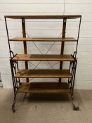 A metamorphic shelving unit industrial in style