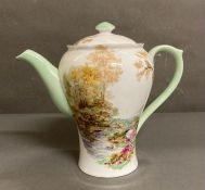 A fine bone china Shelley coffee pot decorated in the "Heater" pattern